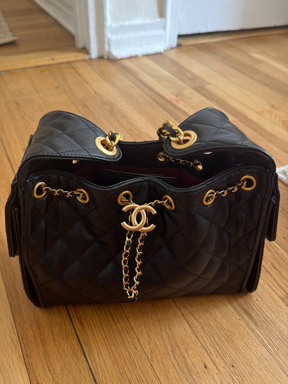 CHANEL 25 Black Quilted Shoulder Drawstring Bag with Gold Hardware